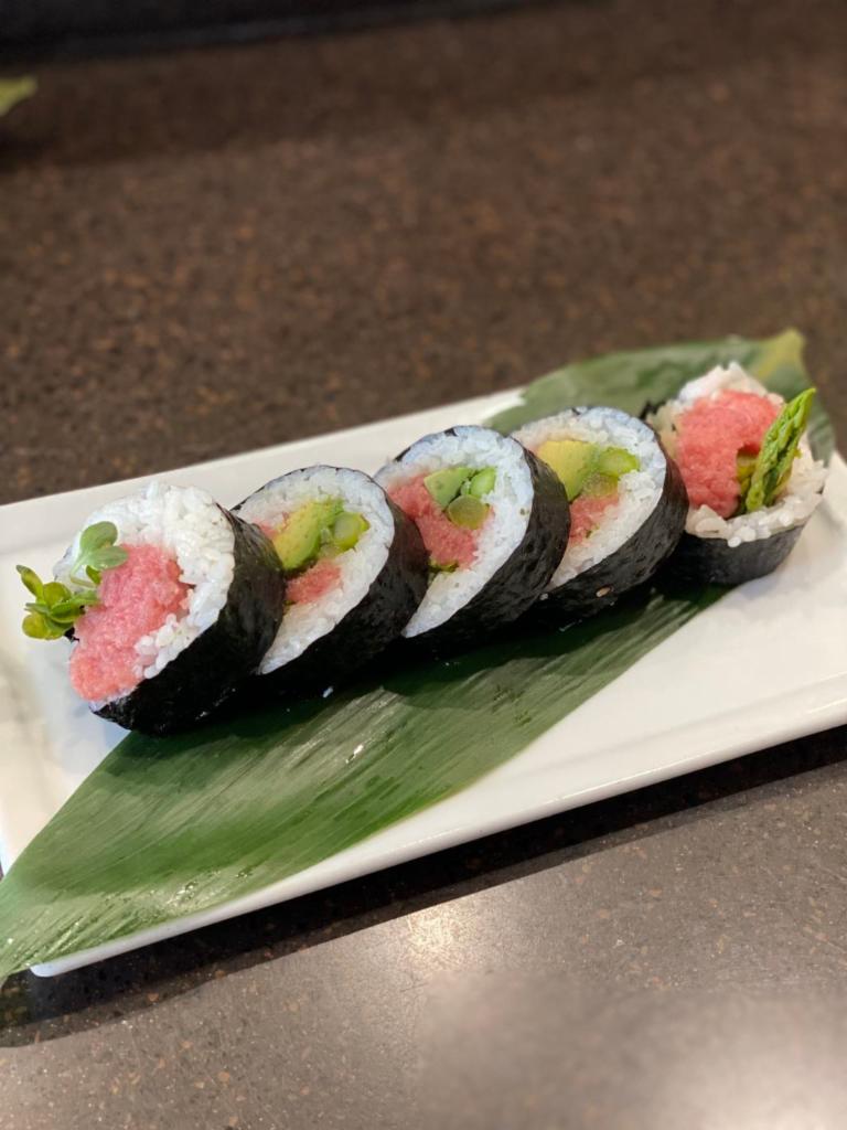 Toro and Asparagus Roll · Minced fatty tuna with asparagus, cucumber, and avocado.