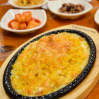 2. Corn Cheese · Baked sweet corns with melted cheese.