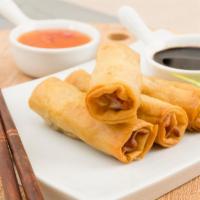 Spring Roll · Slightly fried veggie rolls served with sweet chili sauce. Vegetarian.