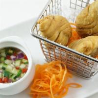 Curry Puffs · Choice of chicken or vegetarian puff, served with sweet cucumber relish sauce