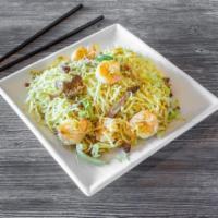 Singapore Rice Noodles · Thin rice noodles, dry yellow curry, shrimp, BBQ pork, eggs, scallions, bean sprouts and whi...