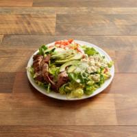 Black and Bleu Steak Salad · Blackened marinated flank steak cooked to specification, served on a mixed green salad toppe...