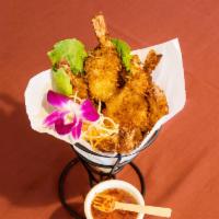 Coconut Shrimp Basket · Golden Fried and Served with Sweet Chili  Sauce