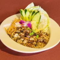Chicken Larb Salad · Ground Chicken Tossed in Spicy Lime Dressing & Served with Fresh Cabbage