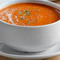 Bowl of Tomato Basil Soup · A creamy blend of vine-ripened tomatoes and fresh basil.