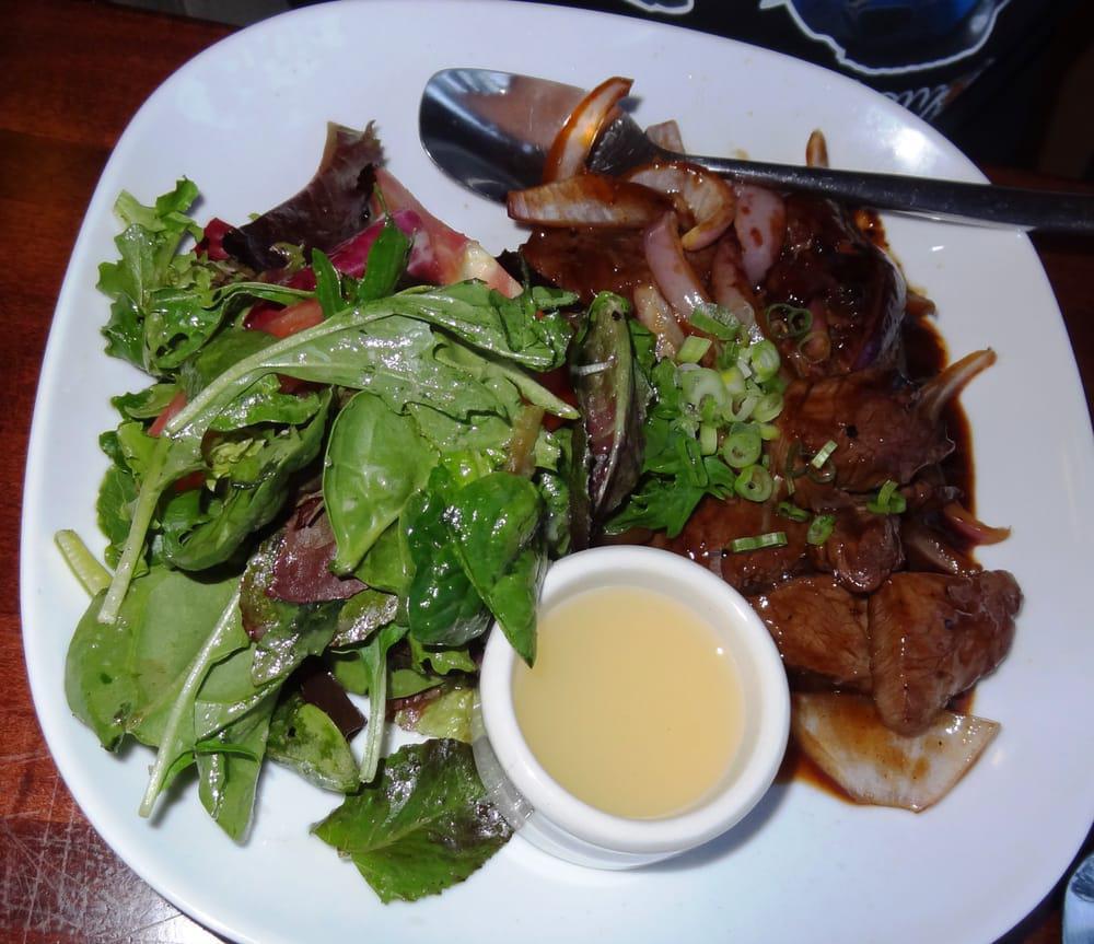 Shaking Beef · Filet mignon over mixed greens, yuzu vinaigrette