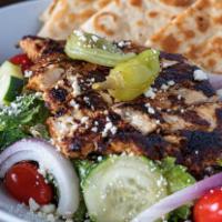 Greek Salad · Romaine lettuce, Greek marinated chicken breast, feta cheese, cucumber, tomato wedges, kalam...