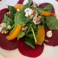 Bietole e Spinaci · Red beets, baby spinach, walnuts and goat cheese in a balsamic dressing.