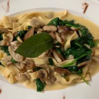 Fettuccine Funghi e Spinaci · Homemade fettuccine with wild mushrooms, spinach, garlic and extra virgin olive oil.