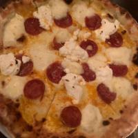 Bianca del Diavolo Pizze · Mozzarella, hot soppressata and fresh ricotta.
