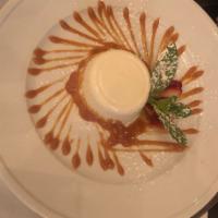 Panna Cotta · Traditional Italian cooked cream with caramel sauce.