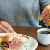French Dip Sandwich · Slow roasted, hand-carved, housemade jus, horseradish cream, fries.