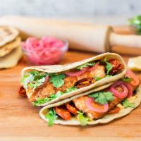 Seafood Tacos · Mesquite-grilled sustainable steelhead salmon or lightly fried shrimp, chili aioli, blistere...