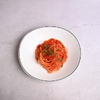 Spaghetti Arrabiata · Served with our homemade sauce, fresh garlic and red chili flakes. Vegan.
