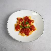 Baked Rigatoni · Layers of rigatoni with ricotta, Italian seasonings, meat sauce and mozzarella cheese. Maria...