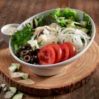 House Salad · Spring mix and romaine with Roma tomatoes, cucumbers, black olives and onions topped with sh...
