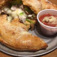 Chicken and Cheese Calzone · Grilled all-natural chicken with mushrooms, onions, green peppers, seasoned ricotta, mozzare...
