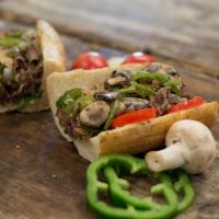 Steak and Cheese Hoagie · Grilled, shaved all-natural ribeye steak, onions, mushrooms, green peppers, provolone, mayo,...