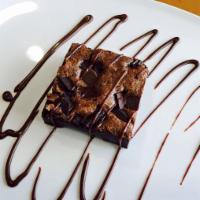 Mary Jane's Triple Chocolate Brownie · No plain Jane brownie here. This one's buttery chocolate, chewy brownie generously studded w...
