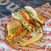 10. Veggie Sandwich · Garden fresh lettuce, tomatoes, cucumbers, carrots, bell peppers and avocado.