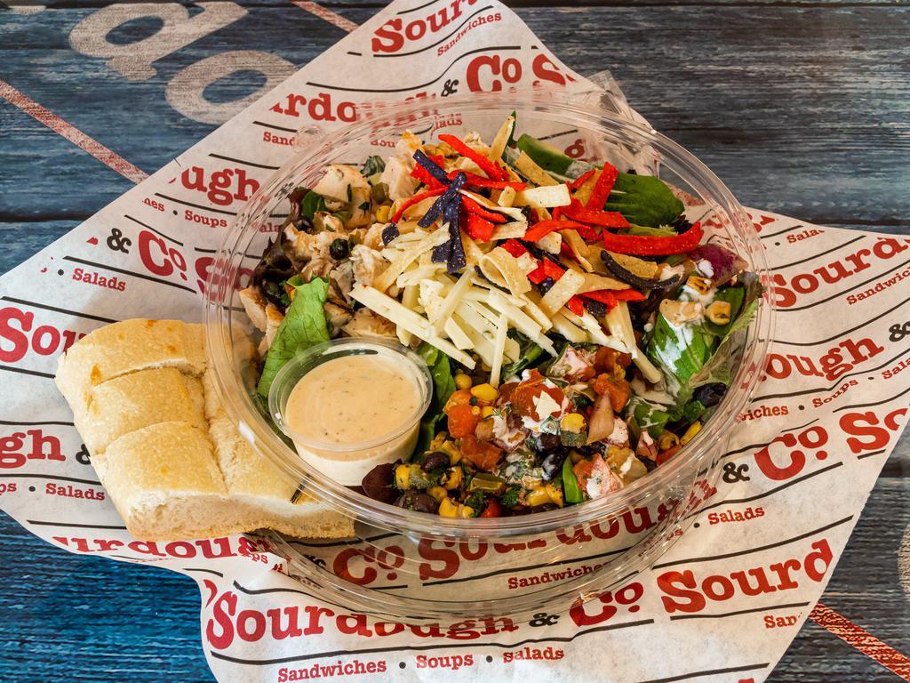 Southwest Chicken Salad · Baby greens and chopped romaine, grilled chicken, sliced avocado, black bean corn salsa, sour cream, tortilla strips and jalapeno ranch dressing.