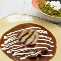 Enchiladas De Queso · Menonita, Oaxaca, and cotija cheeses. Topped with grilled red onion and guajillo salsa. Glut...