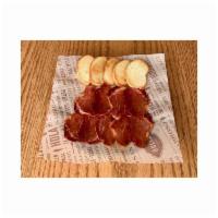 Lomo Iberico · Cured Iberian pork loin. Served with crostini