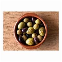 Marinated Olives · Marinated olives with thyme, orange peel and garlic