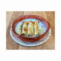 Cannelloni · Catalan Style pork & ground beef, bechamel, mahon cheese, truffle oil