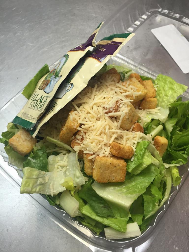 Caesar Salad · Romaine lettuce, crouton and Parmesan cheese.