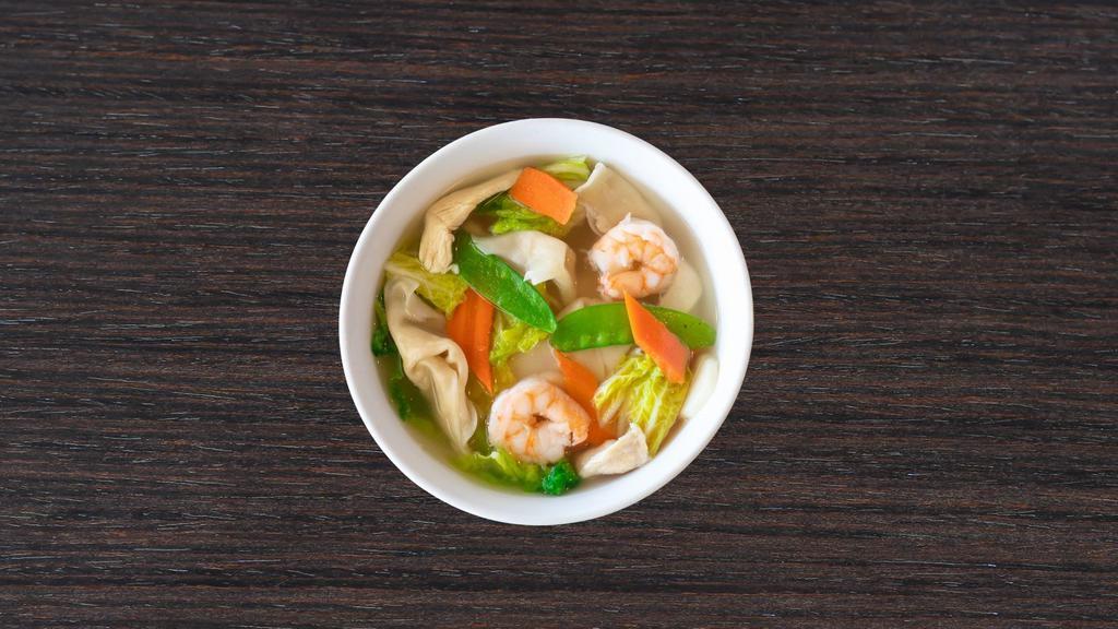 Wor Wonton Soup · Juicy pork wontons, jumbo shrimp, chicken, carrots, water chestnuts, napa cabbage, and snow peas in a rich broth.