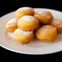 Deep Fried Sugar Donuts (10 pieces) · Buttermilk biscuits deep fried, then tossed in sugar.