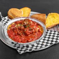Spaghetti and Meatballs · Served with homemade garlic bread.