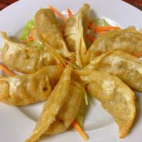 A4. Fried Dumpling(8)炸饺子 · pork 