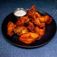 Wings · Cooked wing of a chicken coated in sauce or seasoning. Served with choice of flavors.