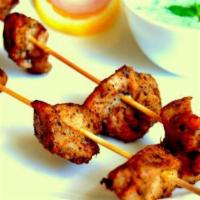 Chicken Tikka Kabab · Boneless cubed breast of chicken, marinated and roasted in our clay oven. Cooked on charcoal...
