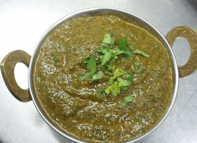 2. Saag Gosht · Fresh chunks of leg of lamb and spinach cooked in curry sauce with fresh green herbs.