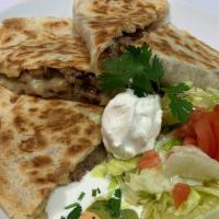 PLT:  Quesadilla con Carne Platter · Cheesy quesadilla with your choice of meat on a flour tortilla, rice, beans, and a side sala...