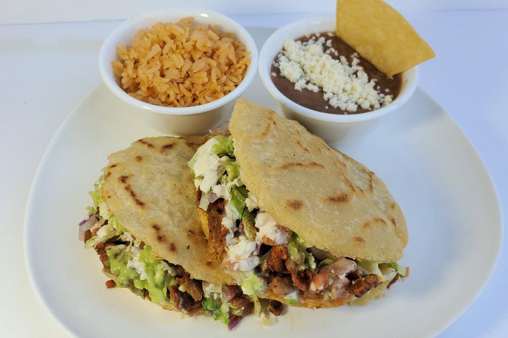 PLT: 2 Gorditas, Rice ＆ Beans · 2 Home made Gorditas,  rice and your choice of beans. 