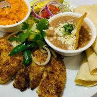PLT: Fish Filet Platter · Perfectly breaded Fish Filet, paired with a side of home made rice, and beans, salad, and yo...