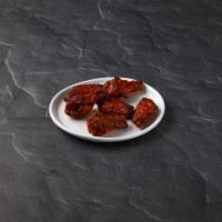 Classic Wings · Tossed in our flavorful sauces and served with 2 oz. creamy ranch.