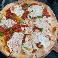 Margherita Pizza · Tomato sauce, homemade fresh mozzarella, basil, and olive oil.