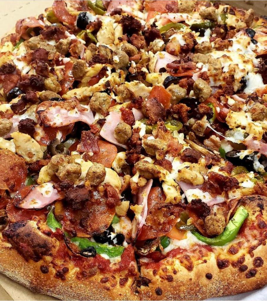 Supreme Pizza · Onion, green pepper, ham, canadian bacon, pepperoni, mushroom, sausage, pineapple, olives, jalapeño, bacon bits, chorizo.