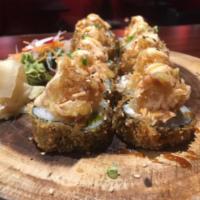 Salmon Rock Roll · 10 cuts. JB tempura roll, topped with chopped salmon, masago, spicy mayo, flake, cilantro an...