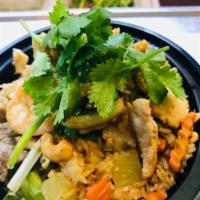 ATK Fried Rice · Fried rice with beef, chicken, pork, shrimp, cashew nut, pineapple and sweet peas.