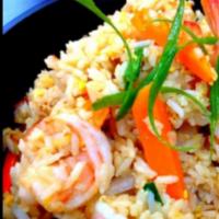 Shrimp Fried Rice · Stir-fried white rice, eggs, onions, carrots and scallions.