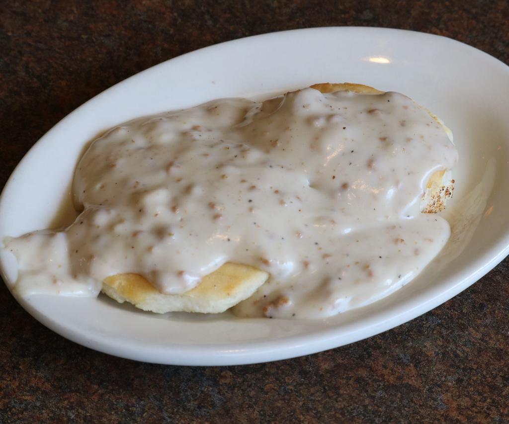 Side of Home Baked Biscuit and Gravy · Homemade biscuit topped with sausage gravy. Add cheese for an additional charge.