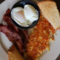 2 Poached Eggs · Served with hash browns and choice of whole wheat, white, or rye bread.