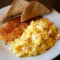 The Neo · Nova, eggs, and onions scrambled style. Served with hash browns and choice of whole wheat, w...