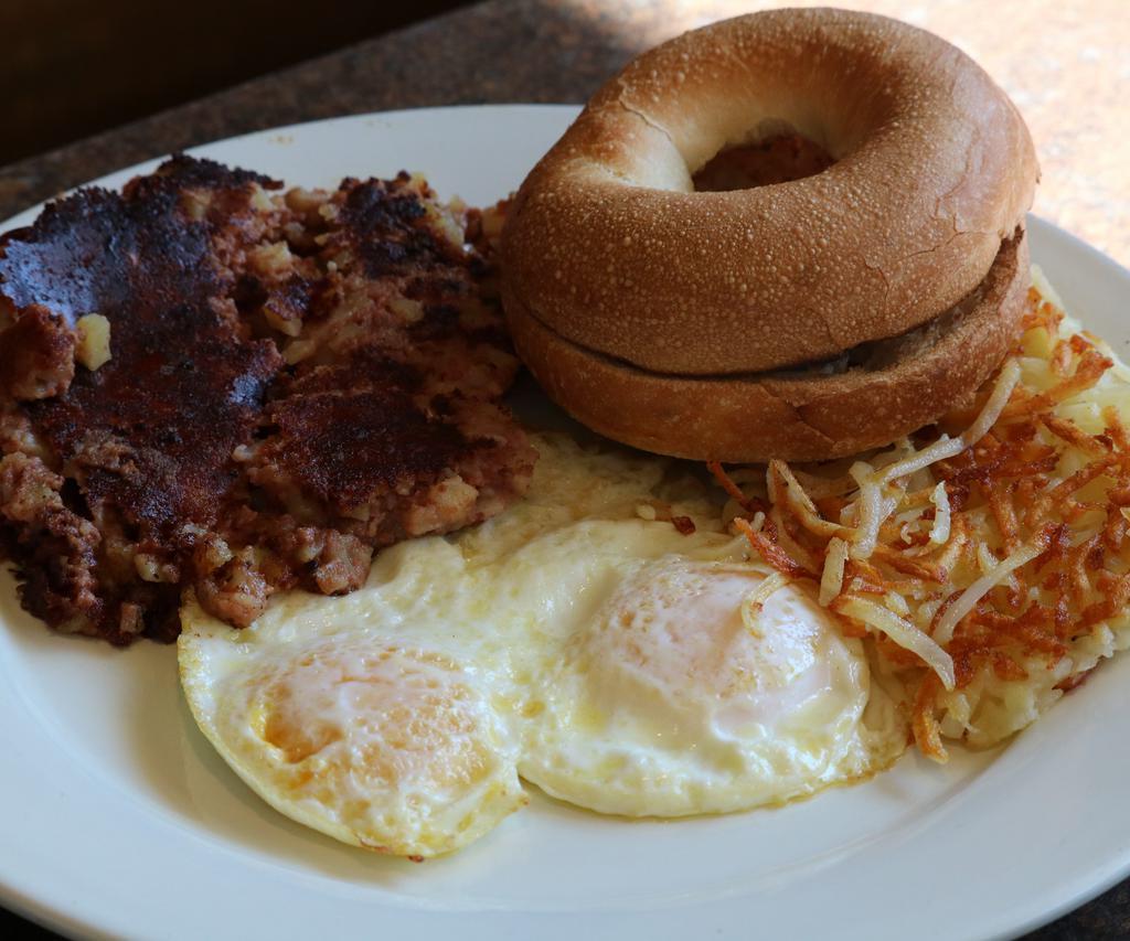 Corned Beef Hash and 2 Eggs Any Style · Served with hash browns and choice of whole wheat, white, or rye bread.